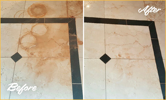 Before and After Picture of a Whitesburg Hard Surface Restoration Service on a Marble Floor to Eliminate Rust Stains