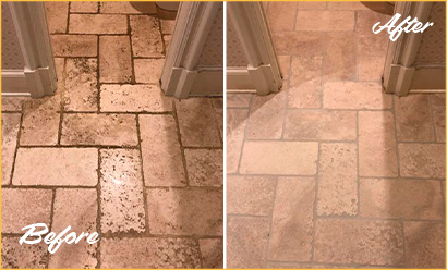 Before and after Picture of a Bathroom's Travertine Floor in Atlanta, GA after a Stone Cleaning Service